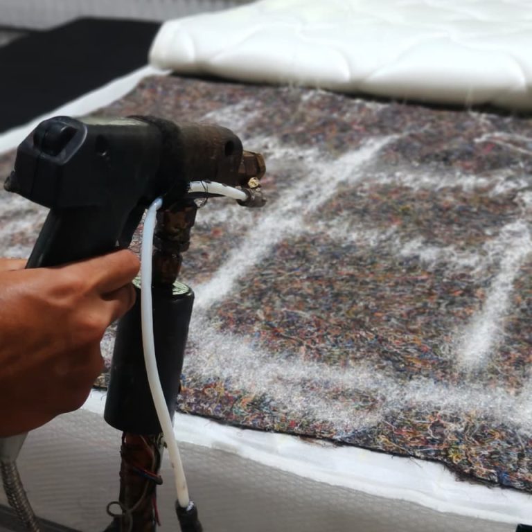 Mattress assembly process with layered materials