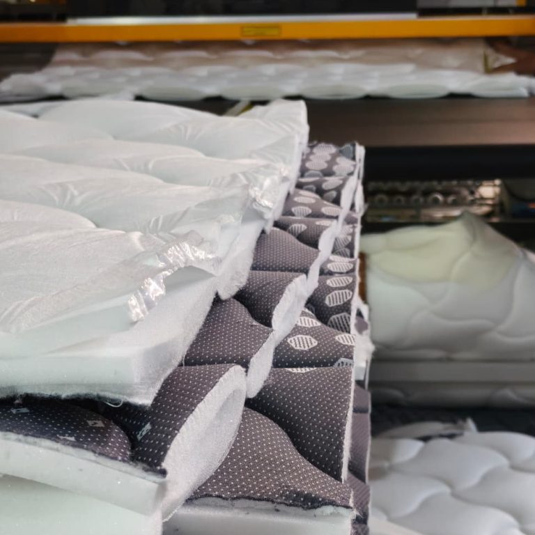 Mattress layers aligned during factory assembly