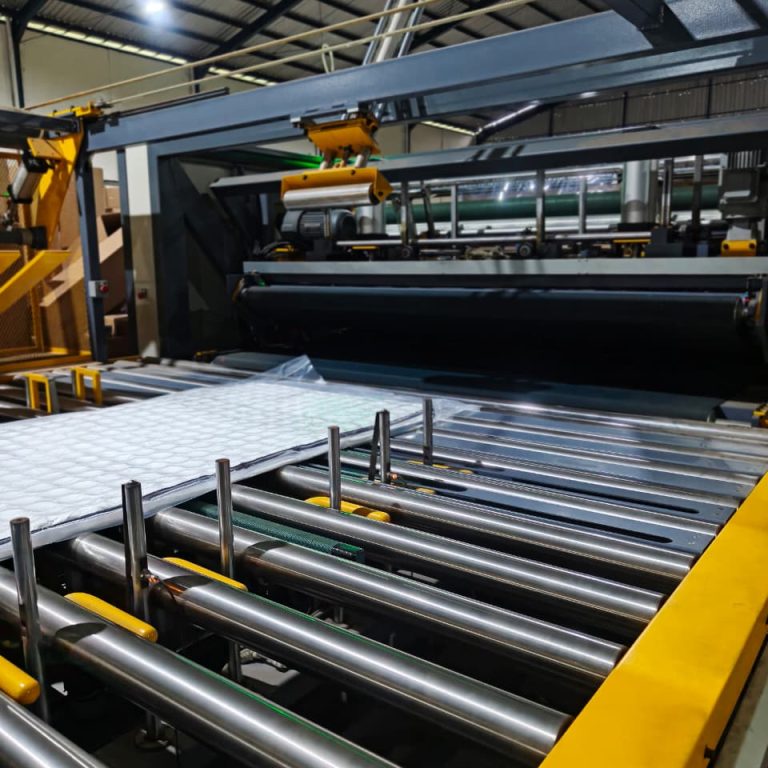 Industrial mattress quilting machine in operation