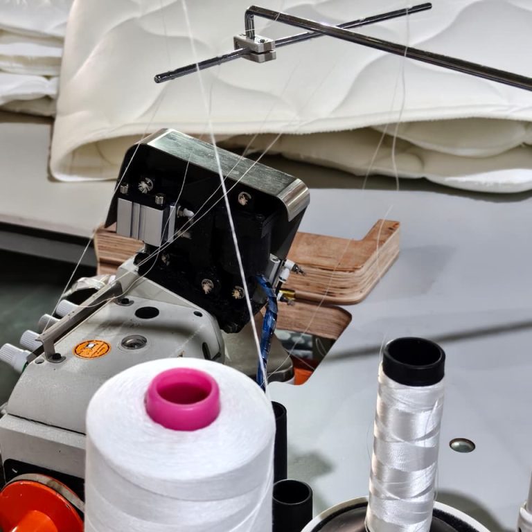 Mattress fabric sewing and finishing process