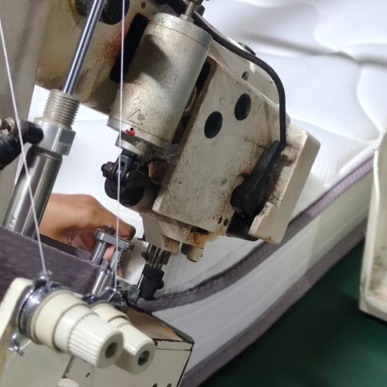 Mattress edge tape sewing process