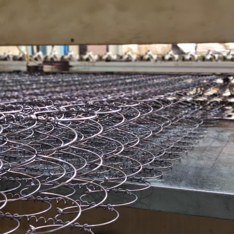 Steel coils during mattress spring production